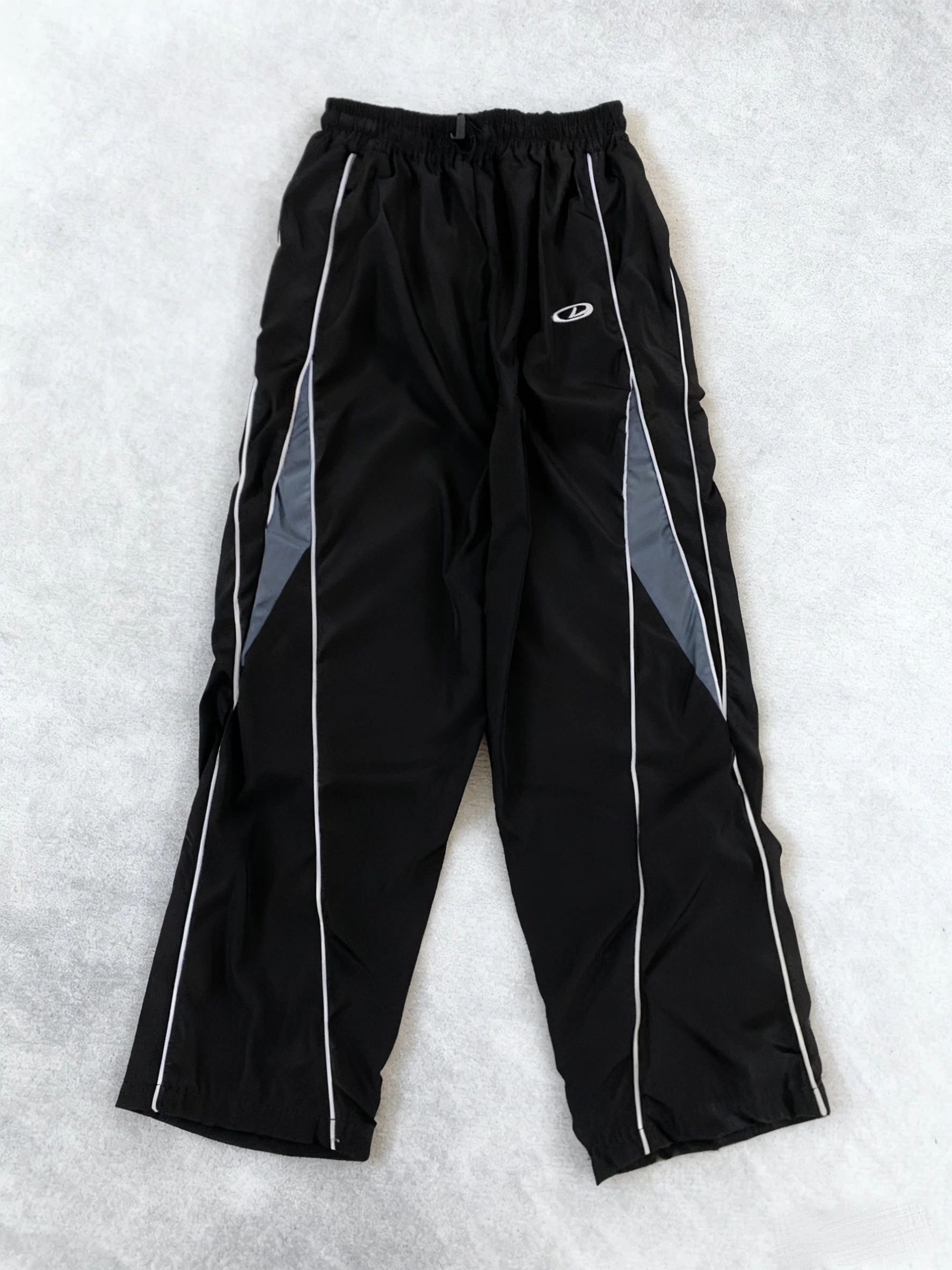 

Уличная мода, персонализированные цветные блокировки, повседневные брюки из микроэластичной ткани, нишевый дизайн, свободные и универсальные брюки.