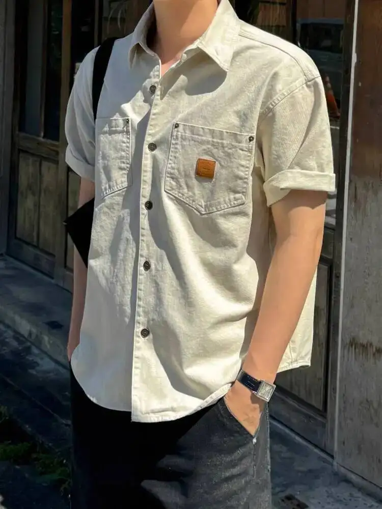 

Korean Style 2025 Summer Men's Shirts Lapel Pockets Single Breasted Casual Tops Short Sleeved Loose Male Clothing