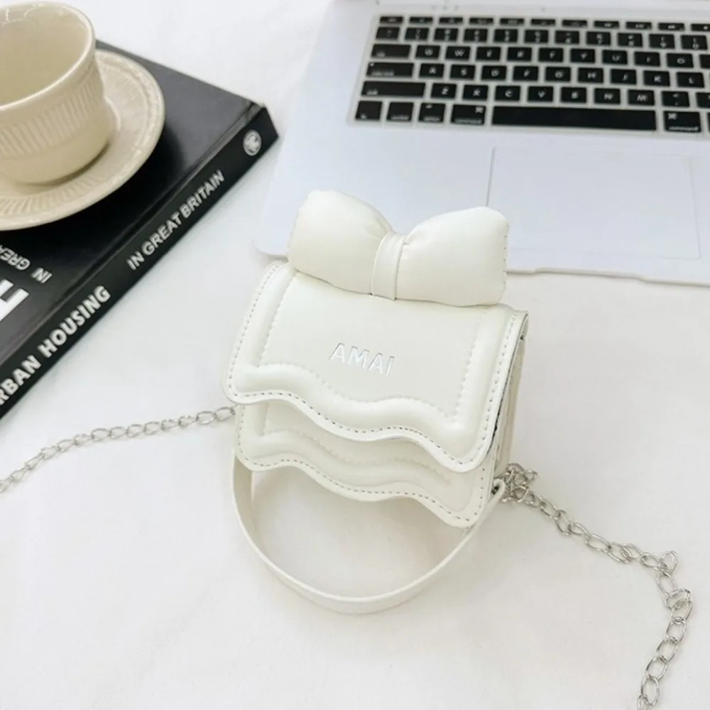 بلون صغير القوس حقيبة كروسبودي بو الجلود حقيبة مربعة صغيرة الحلو حقيبة كتف سلسلة حقيبة ساعي الأطفال حقيبة يد الأطفال