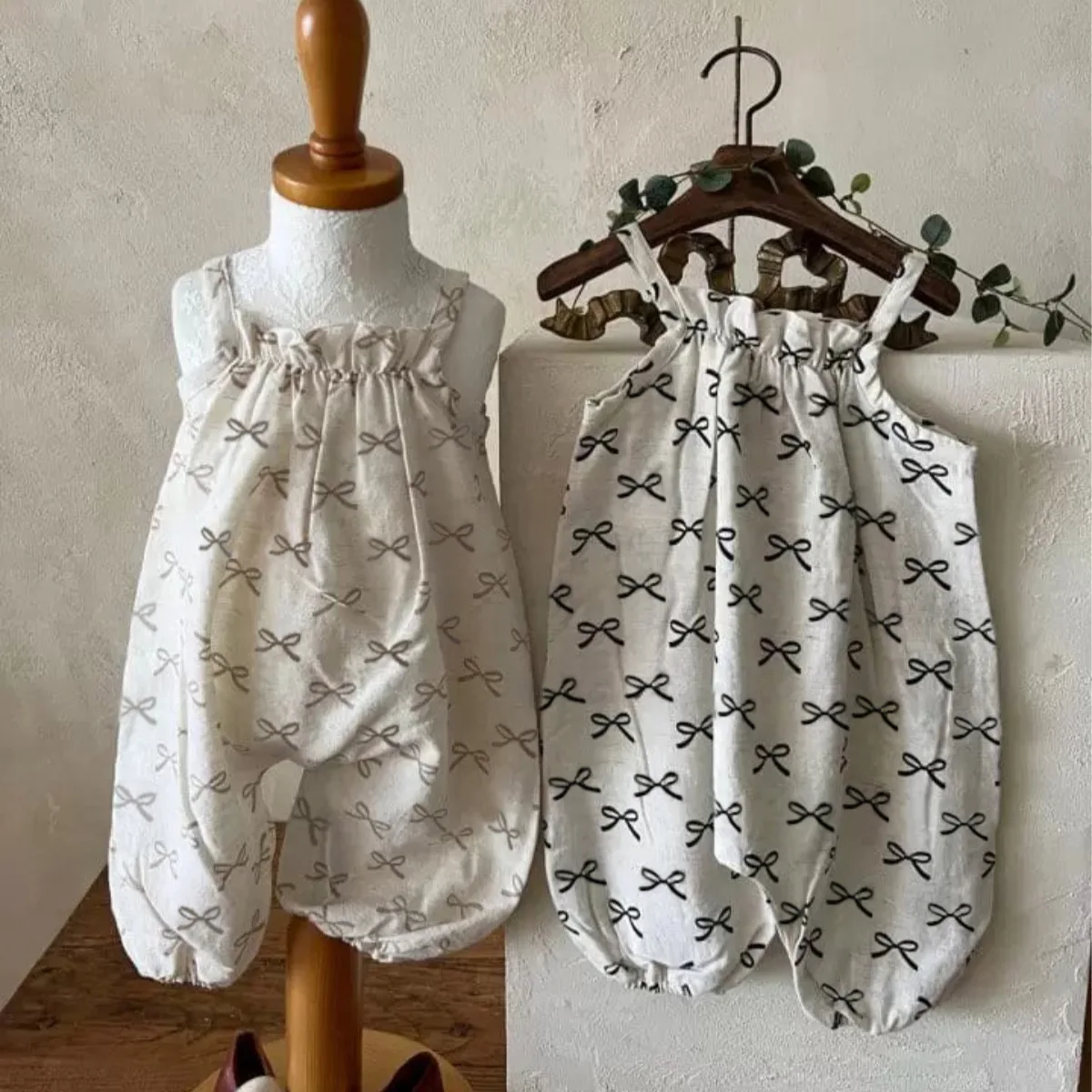 

2025 Summer New Baby Girl Cute Bow Print Sling Jumpsuit Newborn Cotton Breathable Romper Infant Girl Loose Overalls Baby Clothes