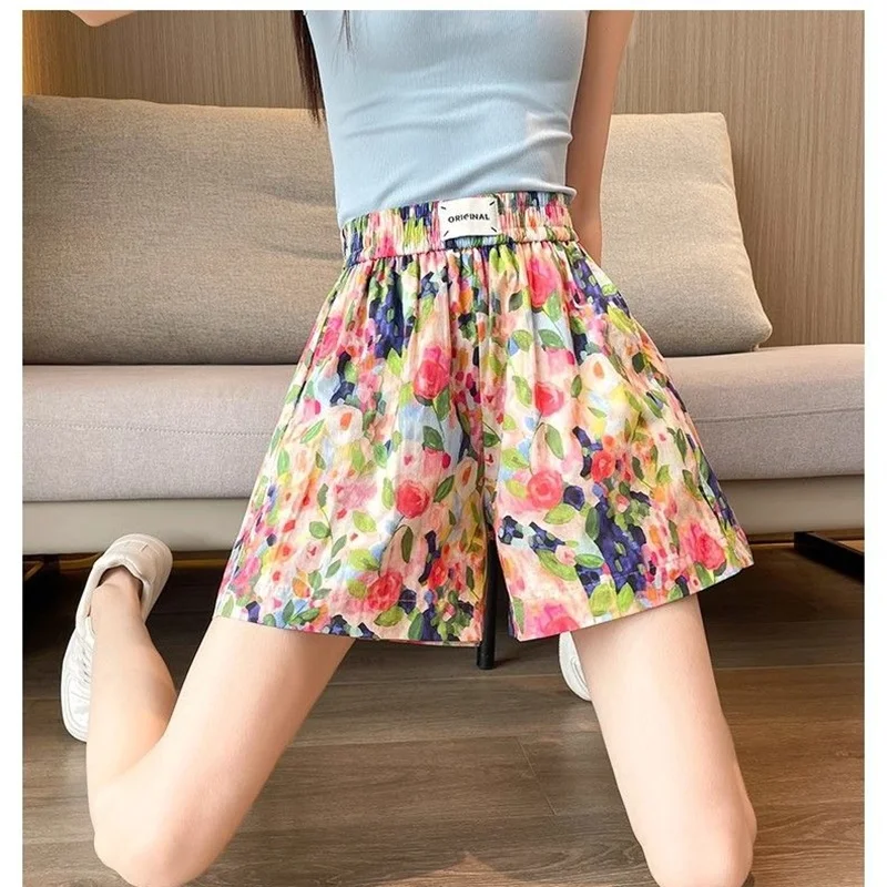 ฤดูร้อนภาพวาดสีน้ํามันดอกไม้กางเกงขาสั้นผู้หญิงสบายๆกางเกงขาสั้นขากว้างขนาดใหญ่หลวมพิมพ์ลายดอกไม้กางเกงขาสั้นElastic Band Casualกางเกง