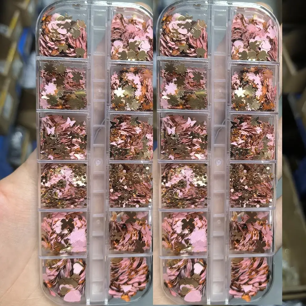 กลิตเตอร์ตกแต่งเล็บ 12 ช่อง 3 มิติ สีชมพูและสีทอง ลายหัวใจ ผีเสื้อ ดอกซากุระ สำหรับตกแต่งเล็บ คริสต์มาส DIY