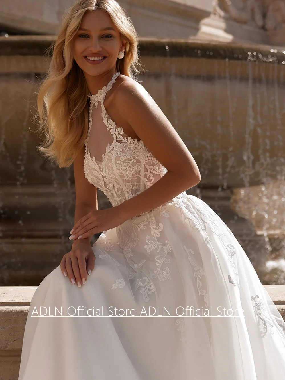 Abito da sposa sexy con scollo all'americana personalizzato senza maniche trasparente con applicazioni in pizzo Sweep Train Abito da sposa linea A per la sposa