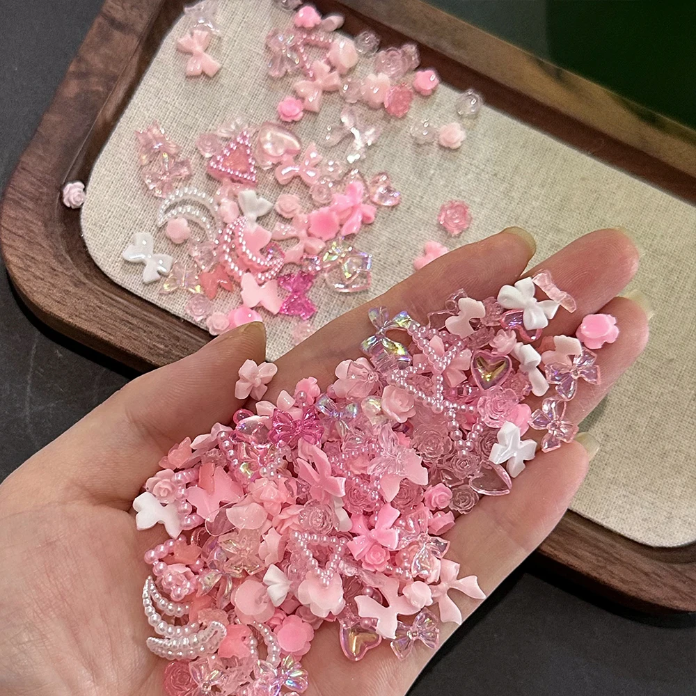 50pcs 3D Kawaii Pink Bow Pearl Nail Rhinestone Mixed Resin Star Moon Heart Flower Gems Nail Charms Y2K Bowknot Nail Art Decorati