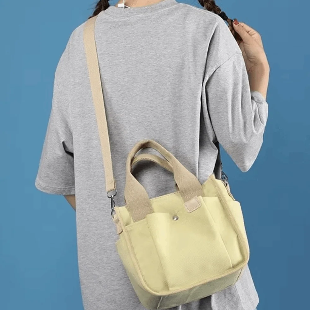 

Multi-pocket Japanese Style Crossbody Bag Handheld Large Capacity Canvas Shoulder Bag Mommy Bag Zipper Solid Color Tote Bag