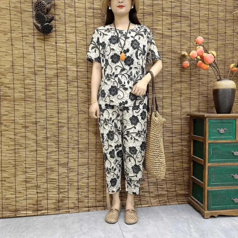 2024 Summer New Mom's Short Sleeved Suit Middle Aged And Elderly Floral Nine Point Pants 2 Piece Set Round Neck Pajama For Women