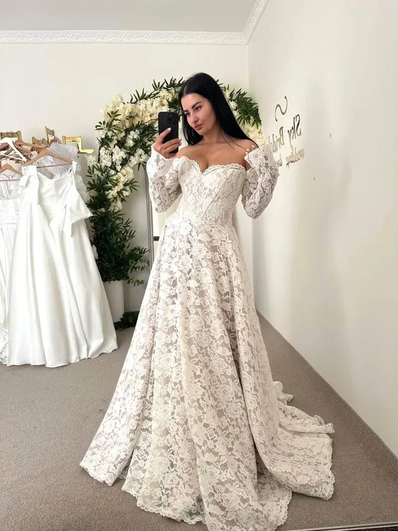 

Customized 2026 Bohemian Lace Applique Wedding Dress With V-Neck Long Lace Sleeves And Trailing A-Line CountrySide Bridal Dress