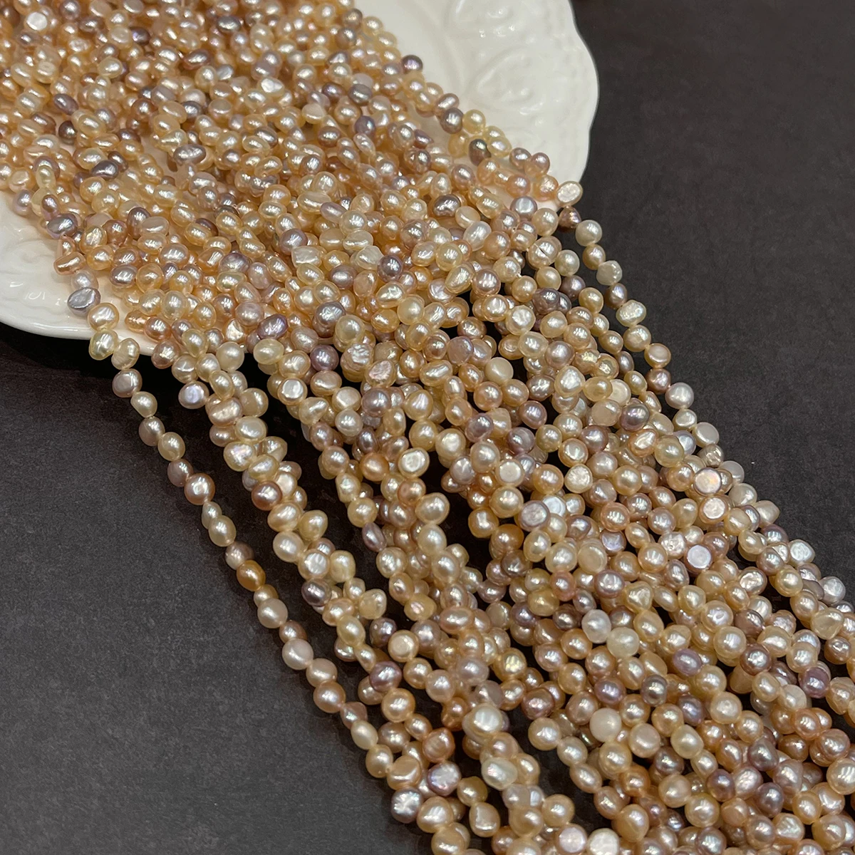 4-5mm Natural Freshwater Pearl - огляд і ціна Natural Freshwater Pearl Strand Loose Beads