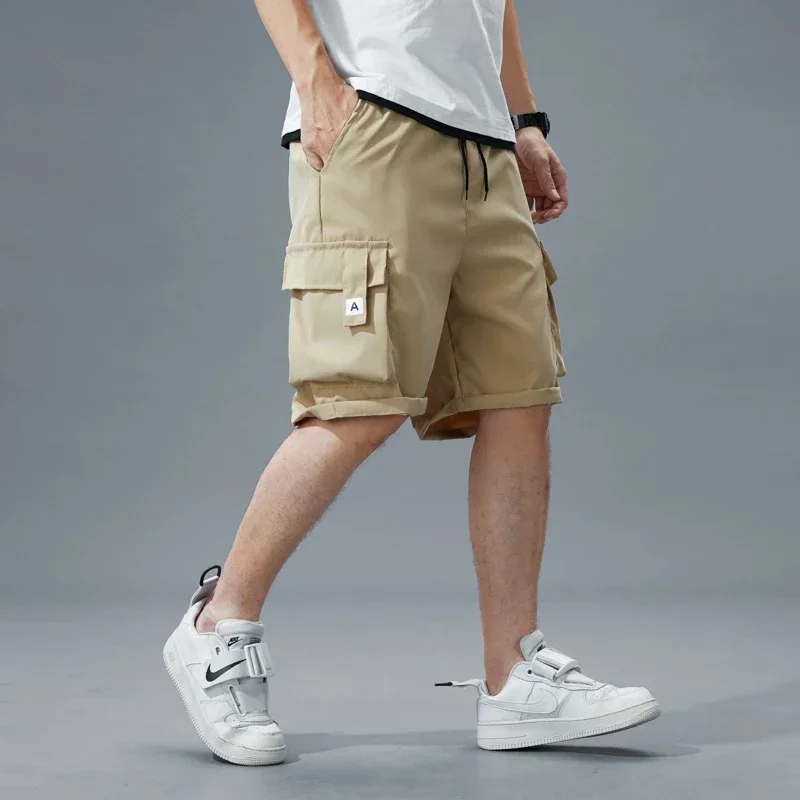 2025 الصيف رقيقة الكورية نمط السراويل الرجال السراويل البضائع غير رسمية الذكور جيوب متعددة مرونة الخصر السراويل خفيفة الوزن حجم كبير