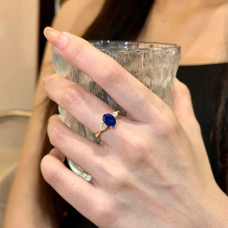 New 100% S925 Silver Simulated Sapphire 6 * 8mm Elliptical Blue Corundum High Fashion Versatile Ring Wedding Jewelry