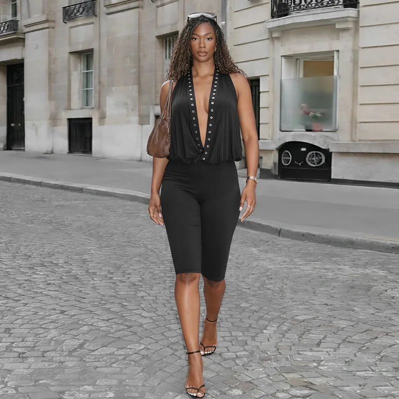 

Сексуальный и дерзкий женский комбинезон J26JP015 в стиле Cross-Border: новинка весенней коллекции с заклепками, вырезом на шее и открытой спиной, длина 7/8