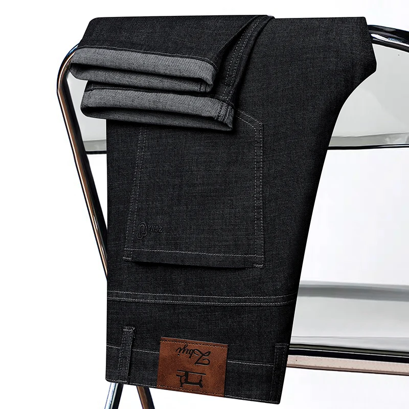 Celana Jeans Denim Stretch Kaki Lurus Warna Solid Mode Baru Musim Semi dan Musim Gugur Celana Berkualitas Tinggi Nyaman dan Longgar untuk Pria