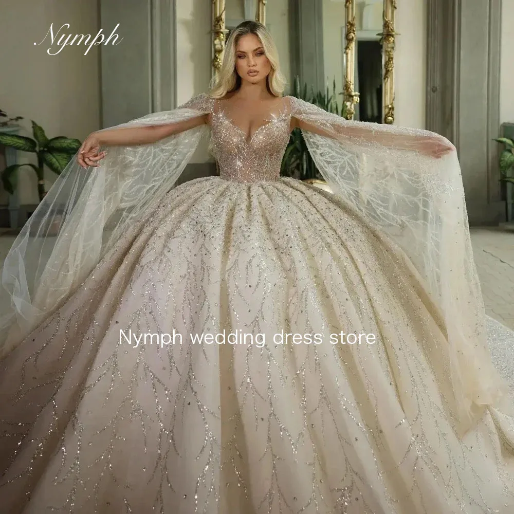 カスタマイズされたゴージャスなキラキラスパンコールのウェディングドレス O ネック長袖花嫁ドレス高級ロング花嫁ローブドバイ Vestido デノビア