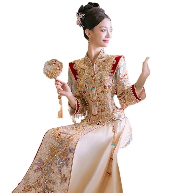 New champagne-colored Chinese-style dragon and phoenix wedding dress