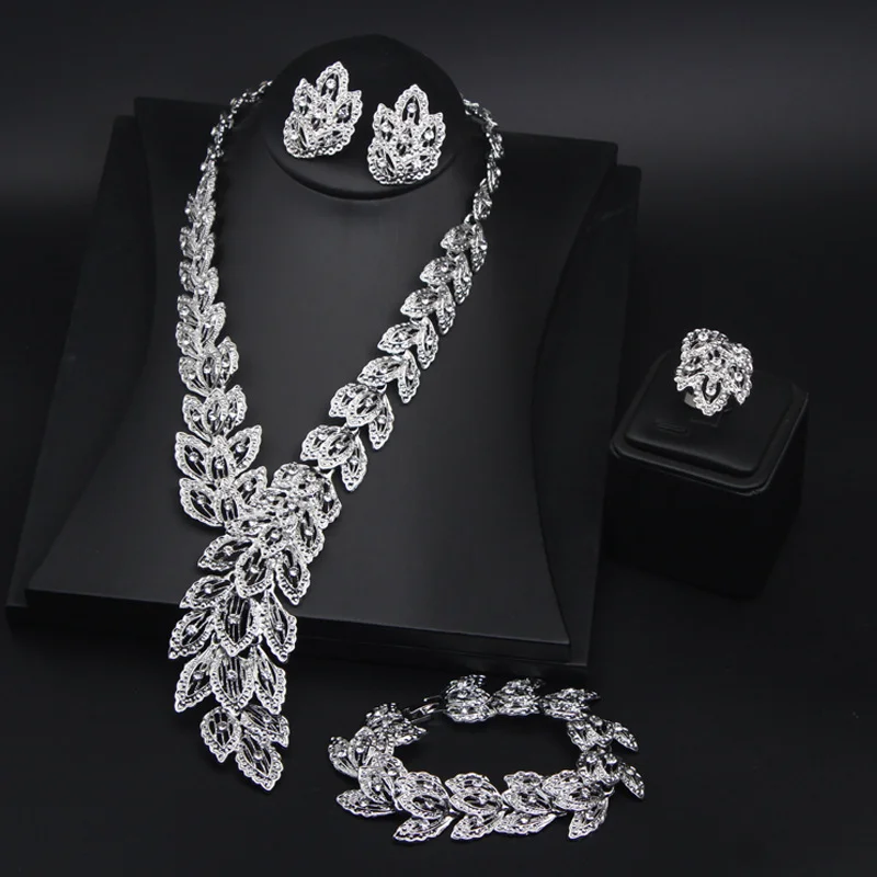 

Alloy Feather Gemstone Necklace Earrings Ring Bracelet Set of Four. High-quality waterproof jewelry