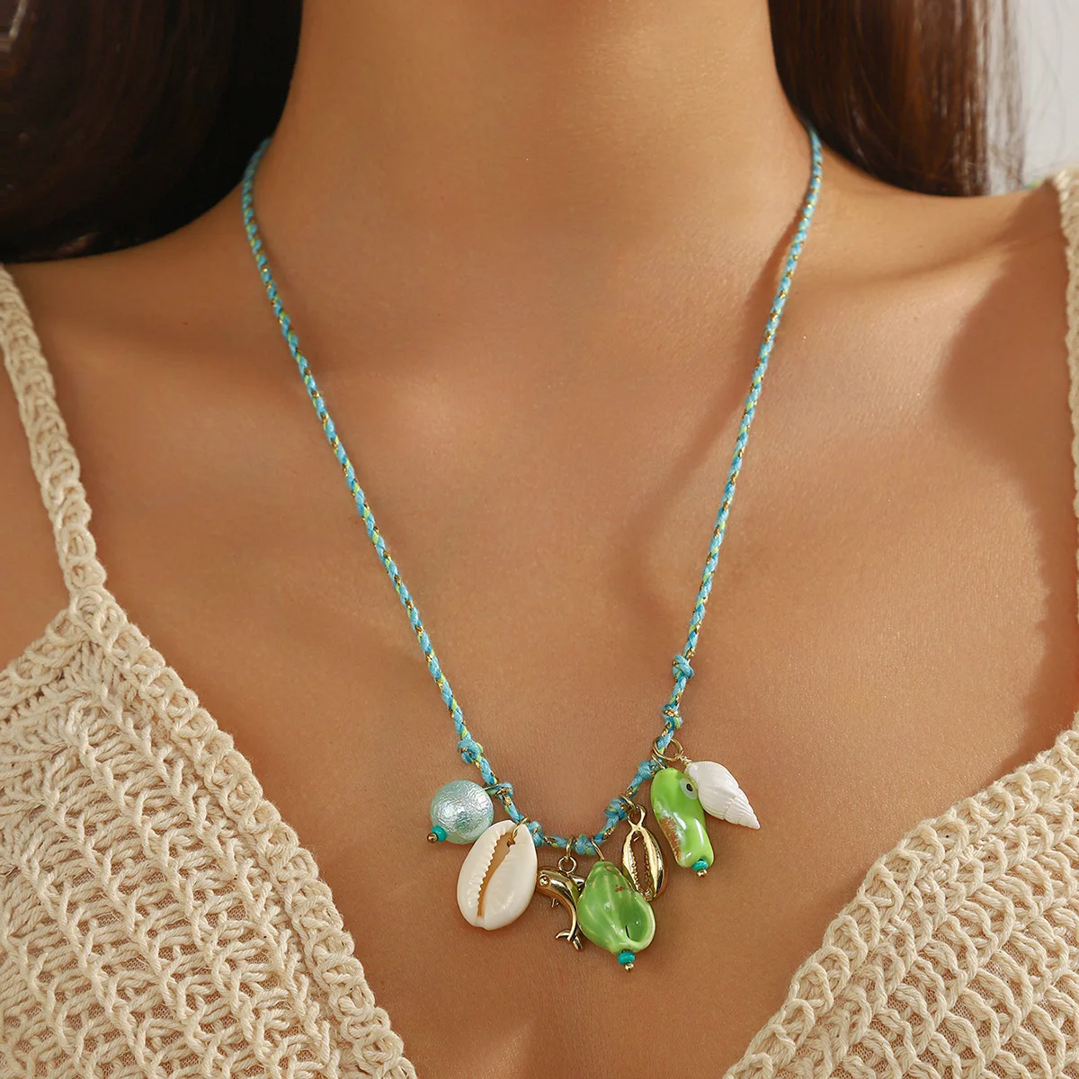 

Braided Cord Necklace with Shell, Starfish, and Ceramic Fish Pendants Summer Boho Necklace