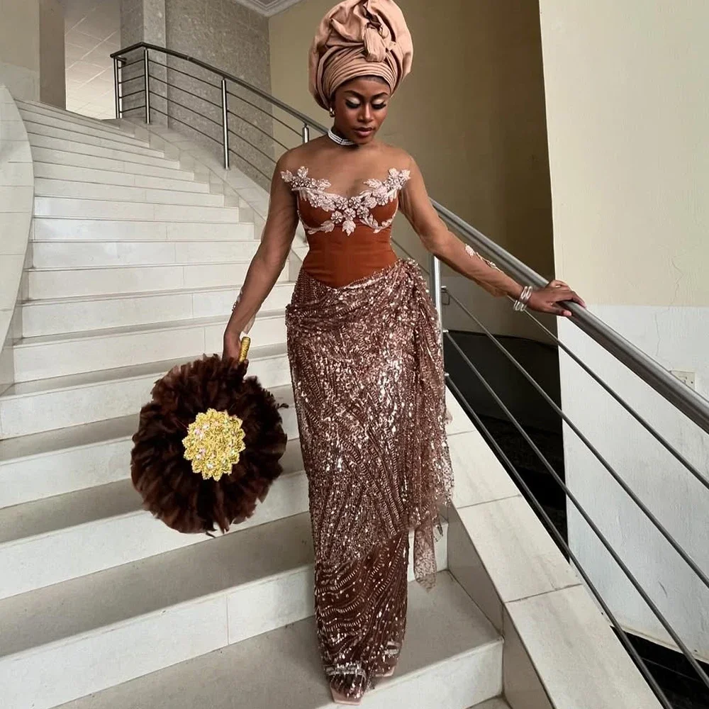 فستان حفلة موسيقية من الدانتيل البني الأفريقي مقاس كبير 2025 شفاف بأكمام طويلة وحفلات الزفاف النيجيرية وحفلات استقبال Aso Ebi التقليدية فستان رسمي