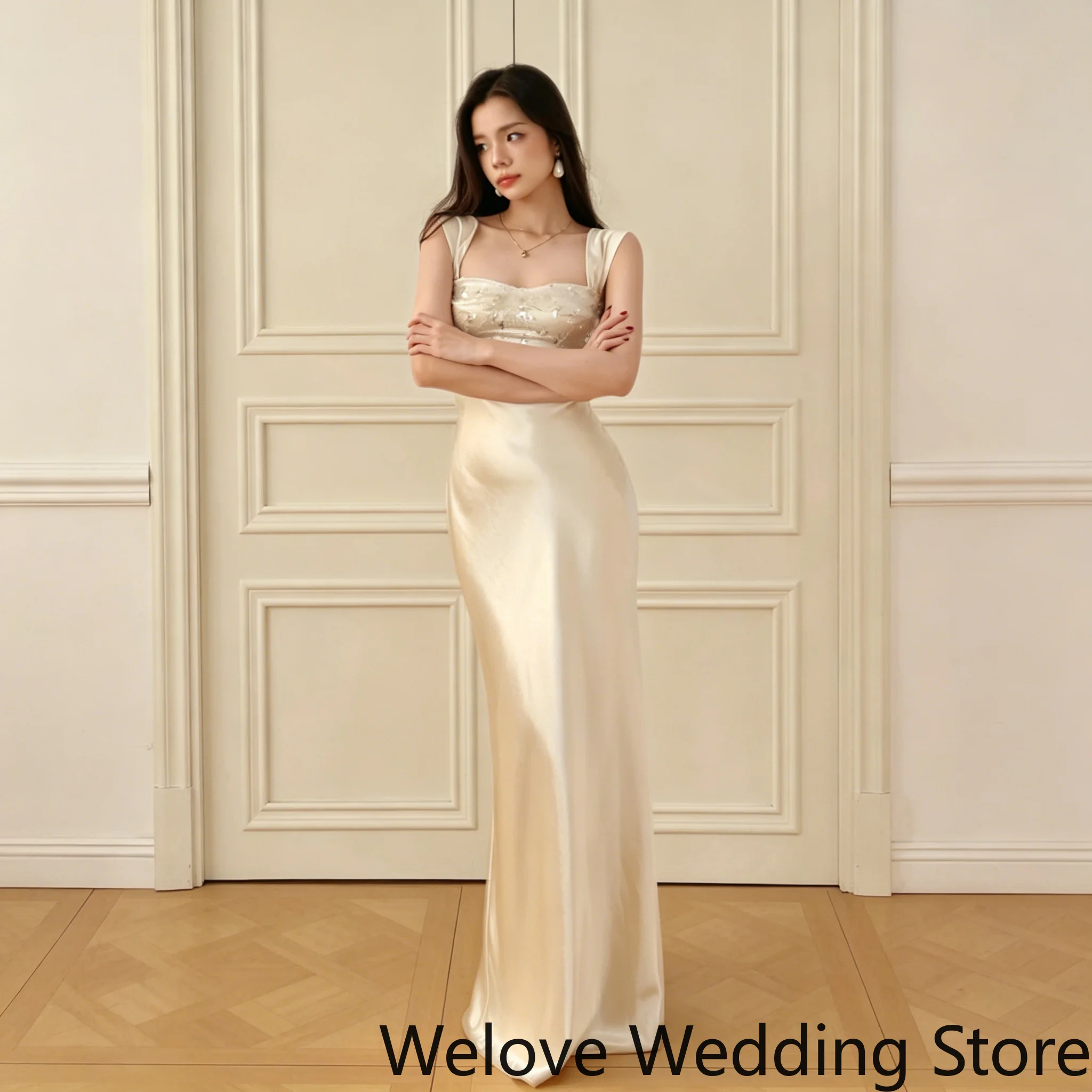 Elegant Ivory Formal Slip Dress featuring a square neckline, delicate sequin detailing on the bust, and wide shoulder straps
