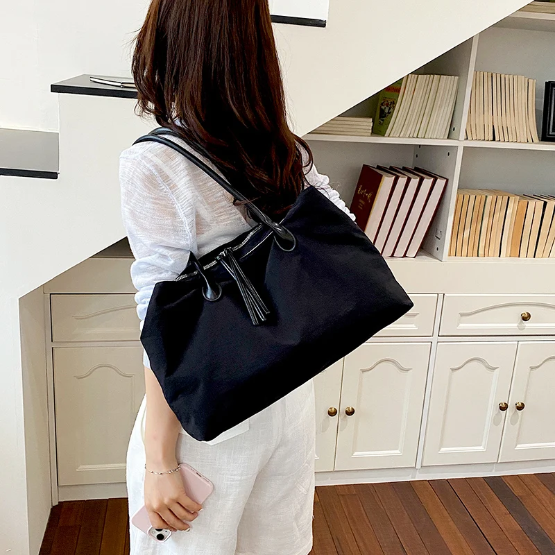 New Lightweight Daily Commute Shopping Shoulder Bag Arrival Minimalist Linen Tote Bags for Women Drawstring Tassel Large Handbag