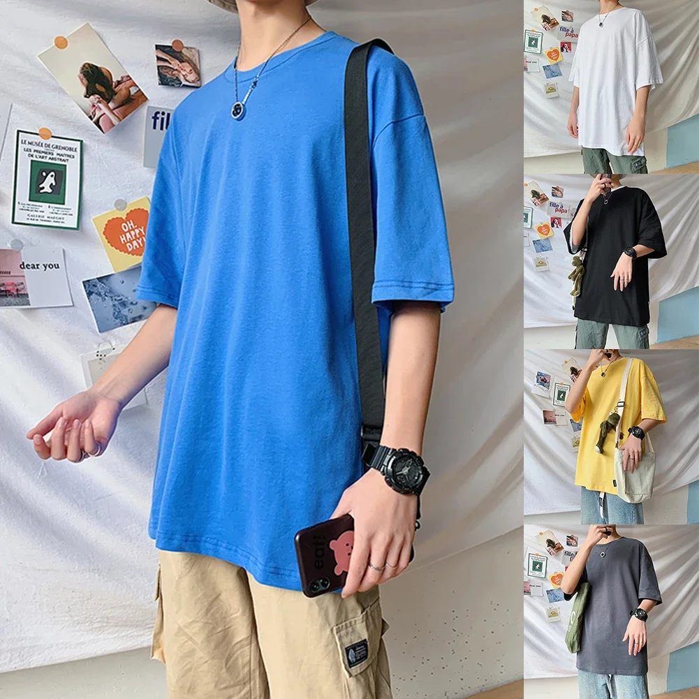 การออกนอกบ้านแบบสบาย ๆ ใช้ทุกวันเสื้อยืดแขนสั้นสีดําเสื้อผ้าทรงหลวมลําลองแขนสั้นลายสีทึบ