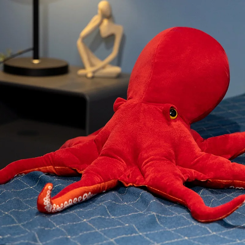 Simulated octopus plush toy in red, super realistic, takes you to experience the charm of the sea and lights up your ocean theme