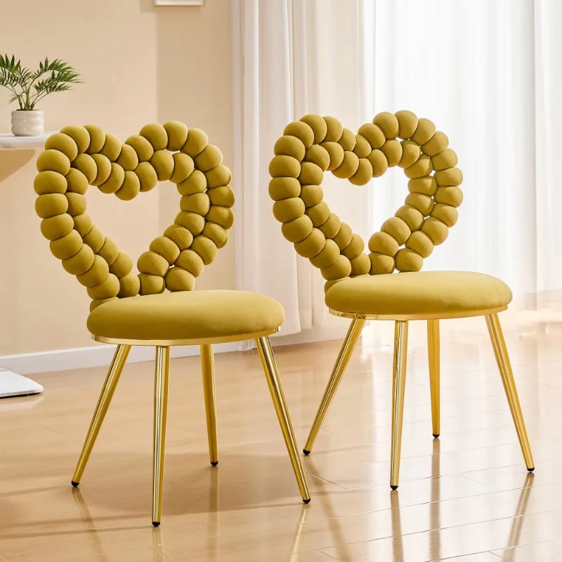 Heart-shaped bubble tufted decorative chair, yellow plush velvet, shiny gold metal frame, modern home seating