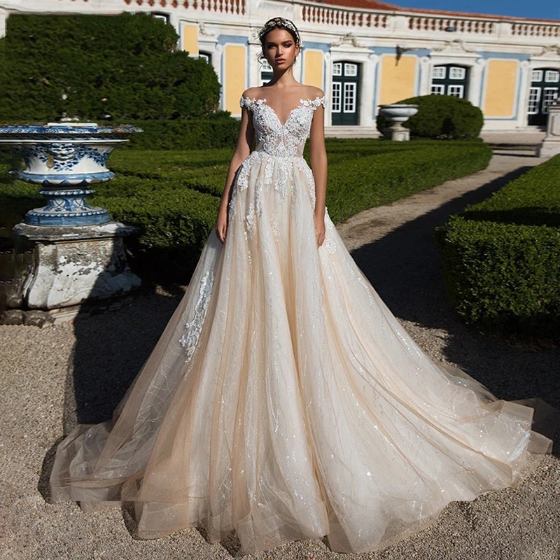 セクシーでゴージャスな A ラインのウェディングドレス女性のエレガントで甘いビーズレースアップリケブライダルドレスプリンセスビーチパーティーボール