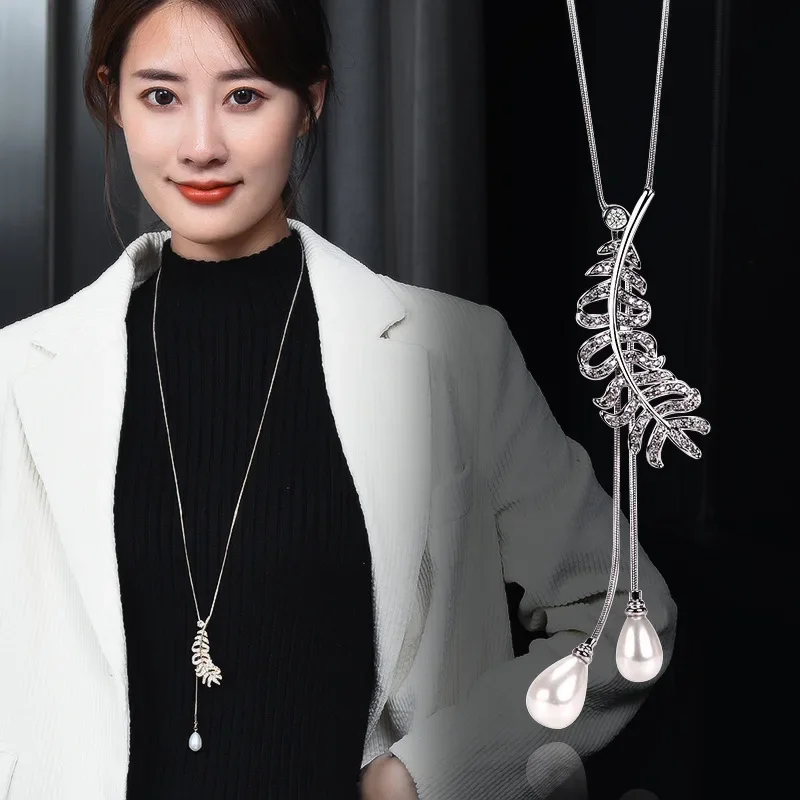 Multi-functional and personalized sweaters, long chain necklaces, and women's feather tassel pendants