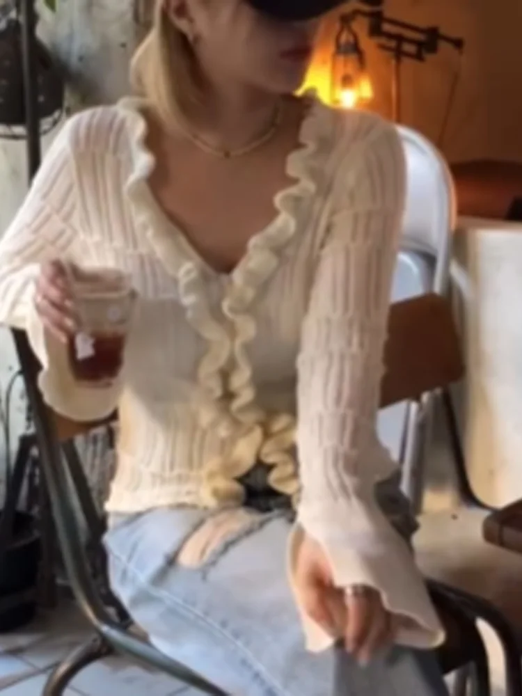 

Hollow Out Solid Knitted Long-sleeve Ruffle Tops Short Slim-fit Button-up Blouse 2026 Woman Spring New Daily Commuting Outfit