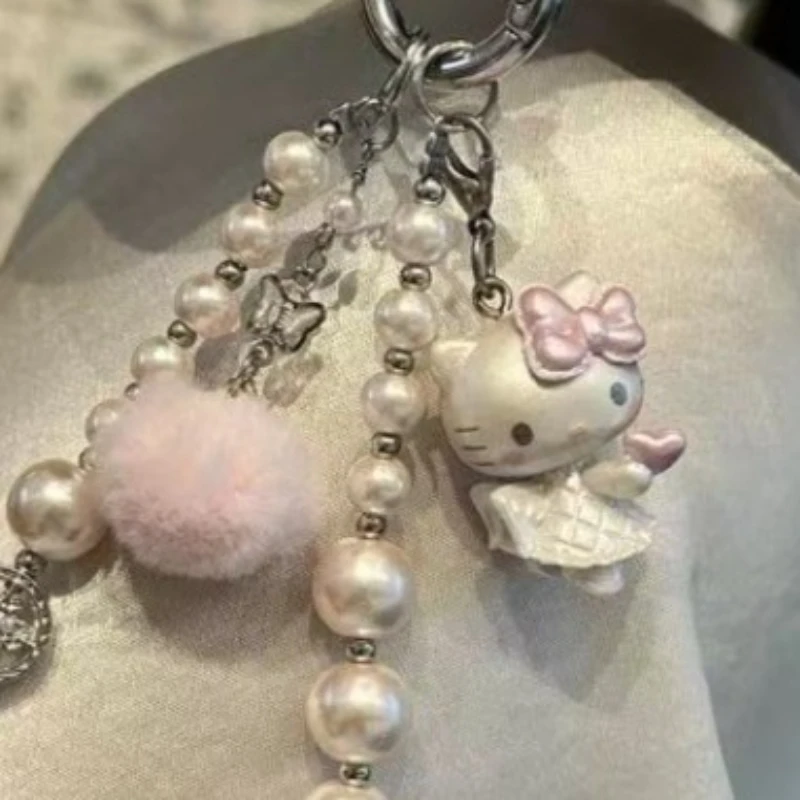 Nouvelle mode rose boule de cheveux KT chat perlé téléphone portable pendentif mode douce fille coeur perle papillon Bracelet