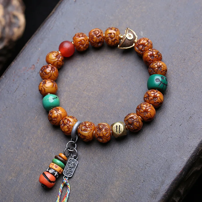Tibetan-Style Yak Bone Carving, Featuring Elephant Deity Motifs, A Single-Strand Bracelet, Agate Beads, And A Set Of Mani Be