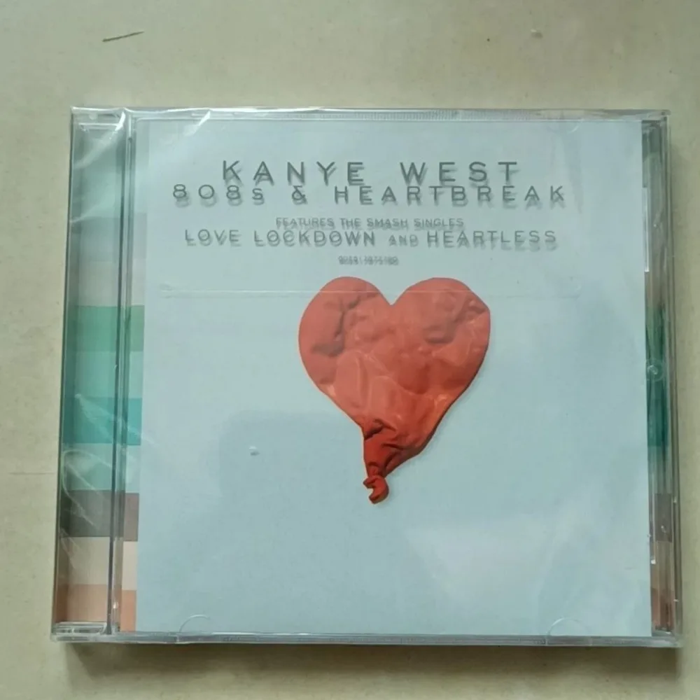

Kanye West 808s and Heartbreak Music Album | Auto-Tune Pop Rap Emotional Melodic Audio CD Disc for Home and Car Audio Playback