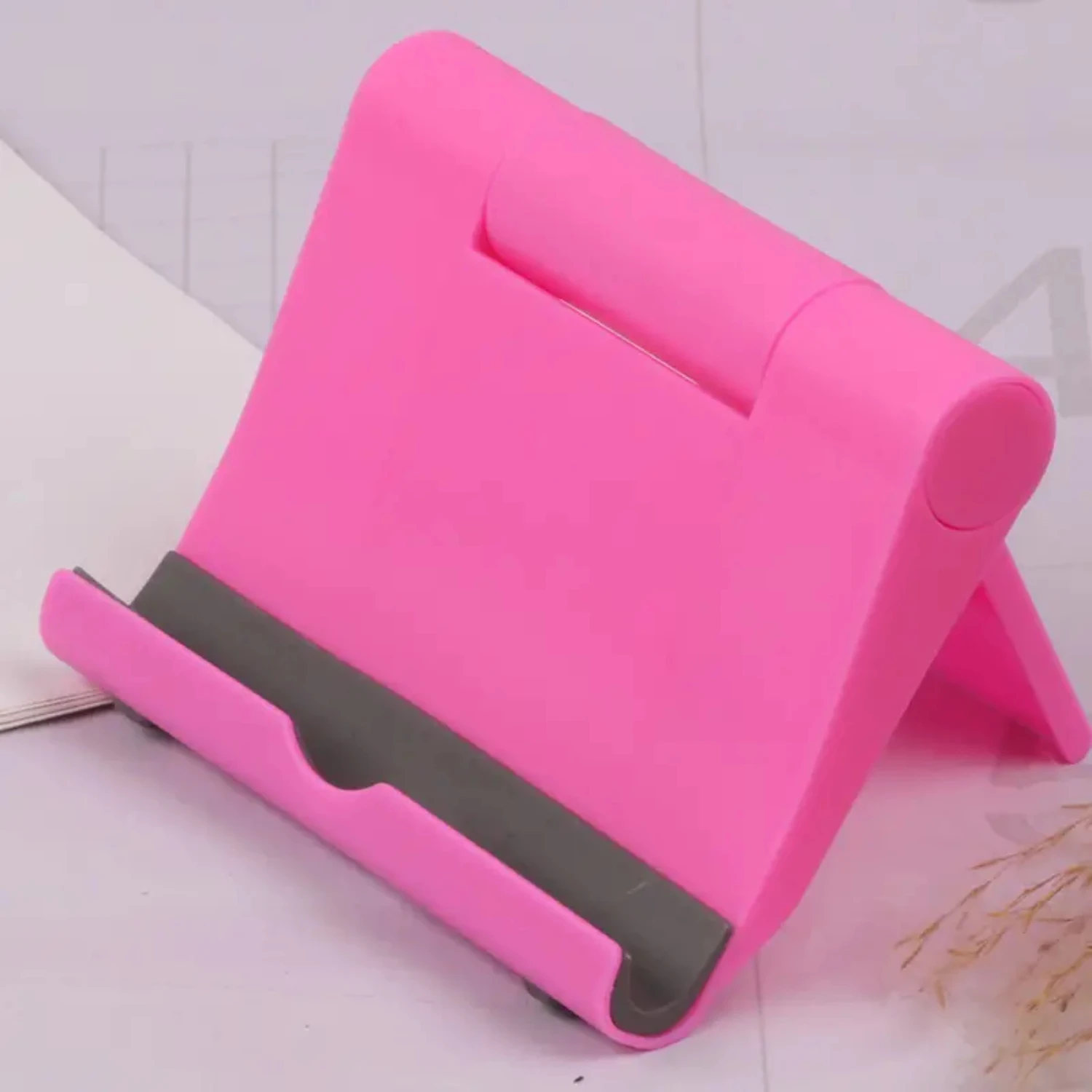 

ent, durable, and portable mobile phone holder stand for desktop. Lightweight and adjustable universal phone cradle for desk. Co
