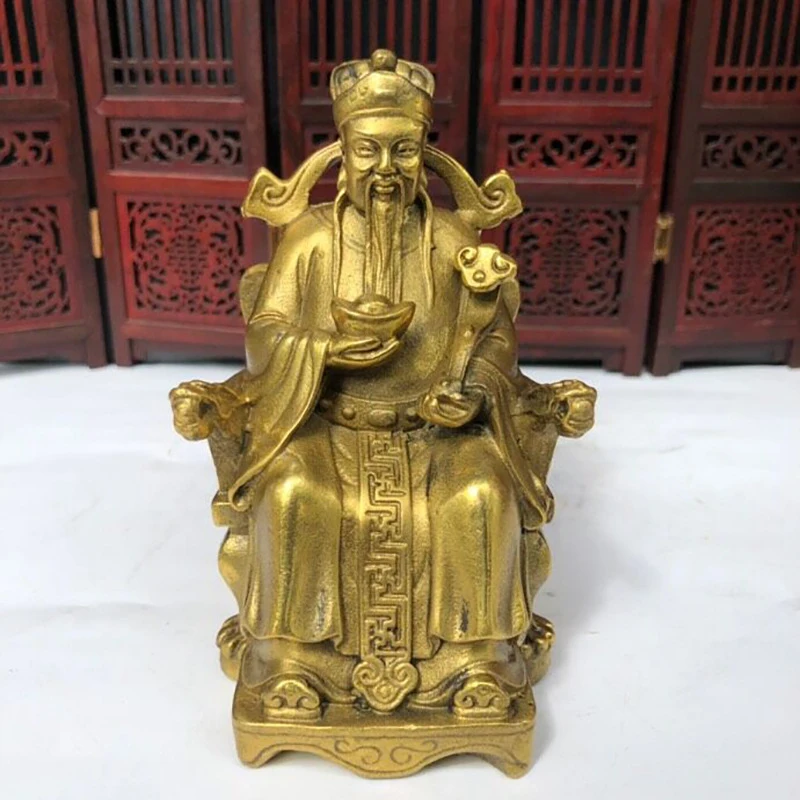 Exquisitely crafted figure of a Buddha sitting on a dragon throne, with a money coin and a wish-fulfilling symbol, brass G