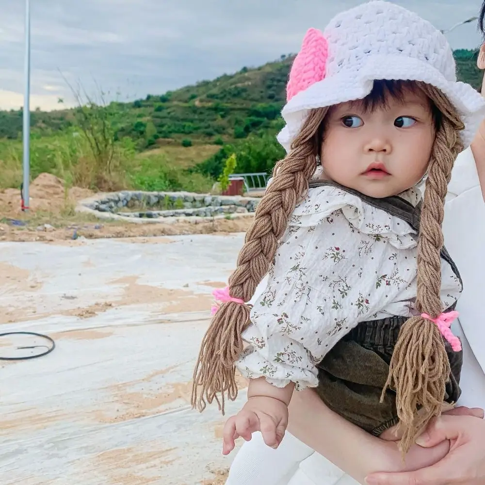 

Детская шерстяная шапка с розовым бантом, вязаная вручную с косами, детская шерстяная шапка для фотосессии, стильный плетеный дизайн для девочек, парики для младенцев