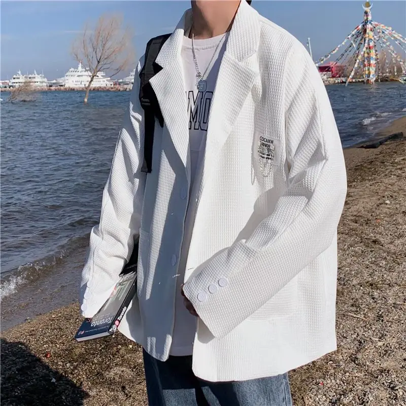 

Мужской повседневный белый пиджак для осени и зимы, модный, свободного кроя, классический, с длинным рукавом, на пуговицах, однотонный, молодежный, элегантный.