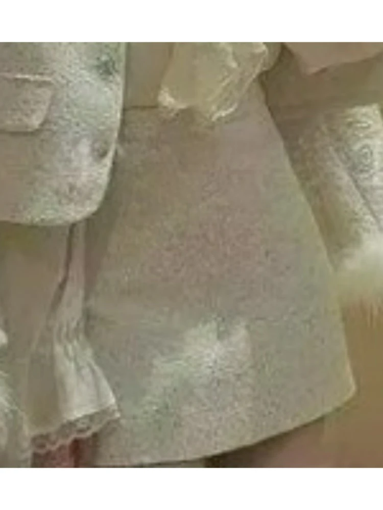 Modny zestaw Xiaoxiangfeng: spódnica i krótki płaszczyk damski na wiosnę i jesień, nowy, elegancki, z temperamentem, w stylu socjality, dwuczęściowy komplet.