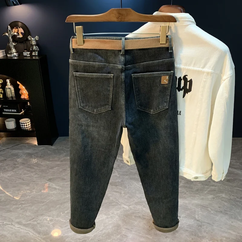 جينز رجالي شتوي مبطن بالصوف 2025 موضة جديدة عصرية قابلة للتمدد دافئة سميكة مستقيمة سليم صالح بناطيل ضيقة