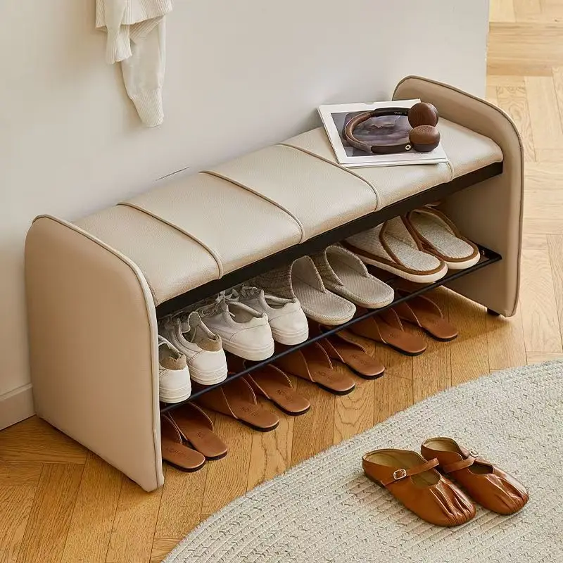 The shoe changing stool is integrated with household storage at the door