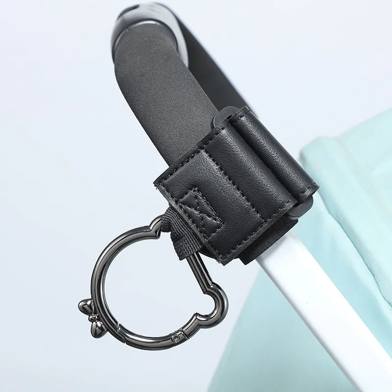 Picture 6: New 1/2 PCs PU Leather Baby Stroller Hooks Heavy-loaded Leather Pram Hanging Clips Pushchair Hanging Bag Hook with Carabiner