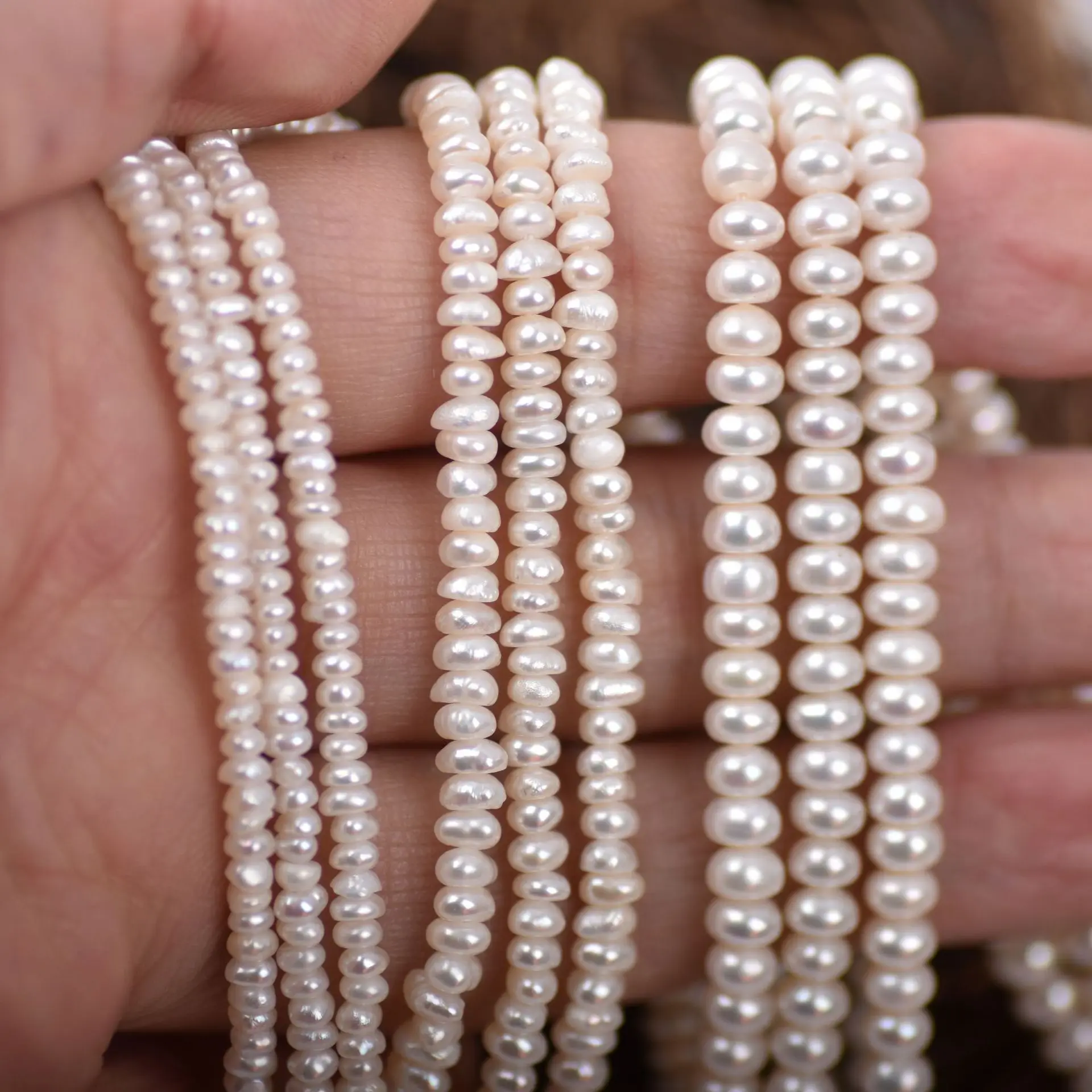 

Wholesale cultured freshwater flat round baroque seed pearls 2-3mm button pearls for Jewelry making