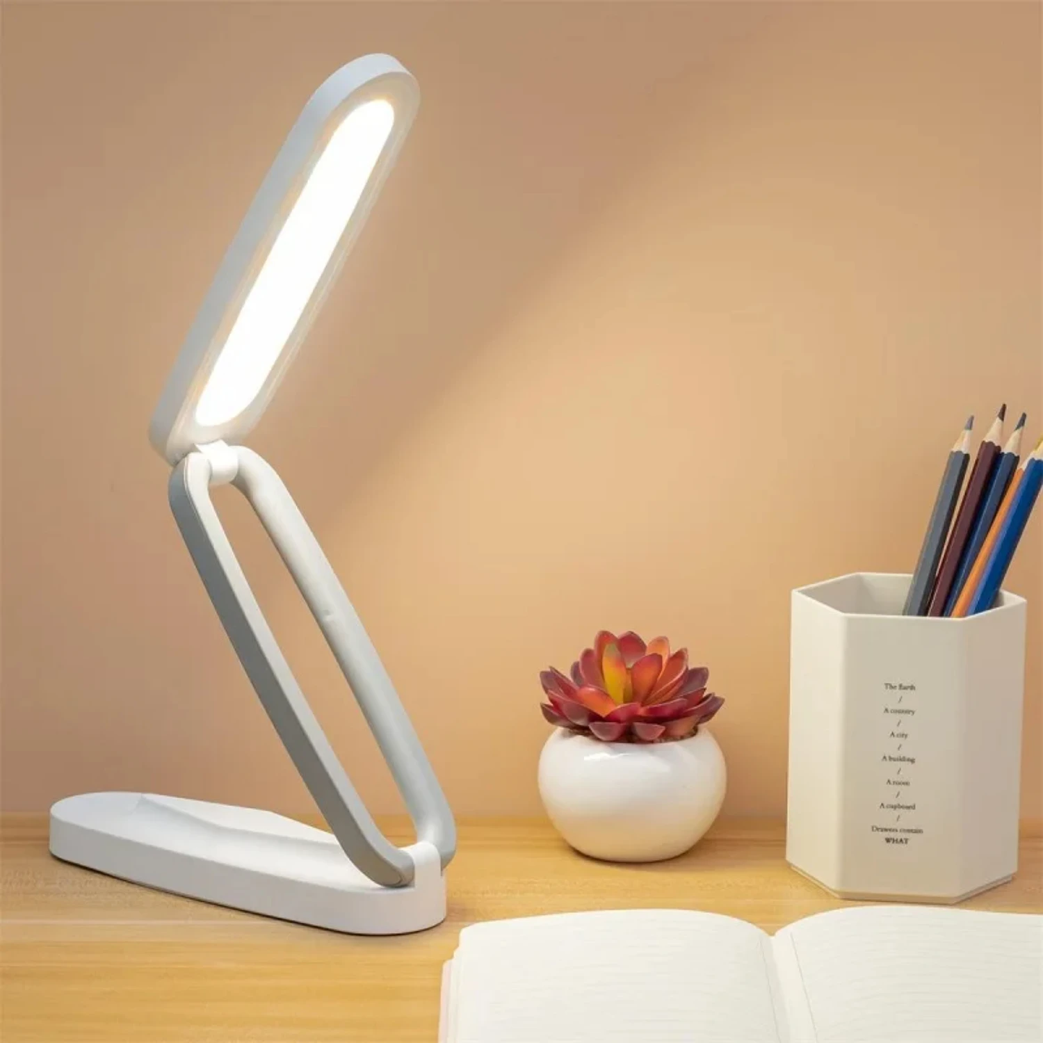 Stylish, portable and dimmable rechargeable LED desk lamp for reading and office table with eye protection. This new arrival boa