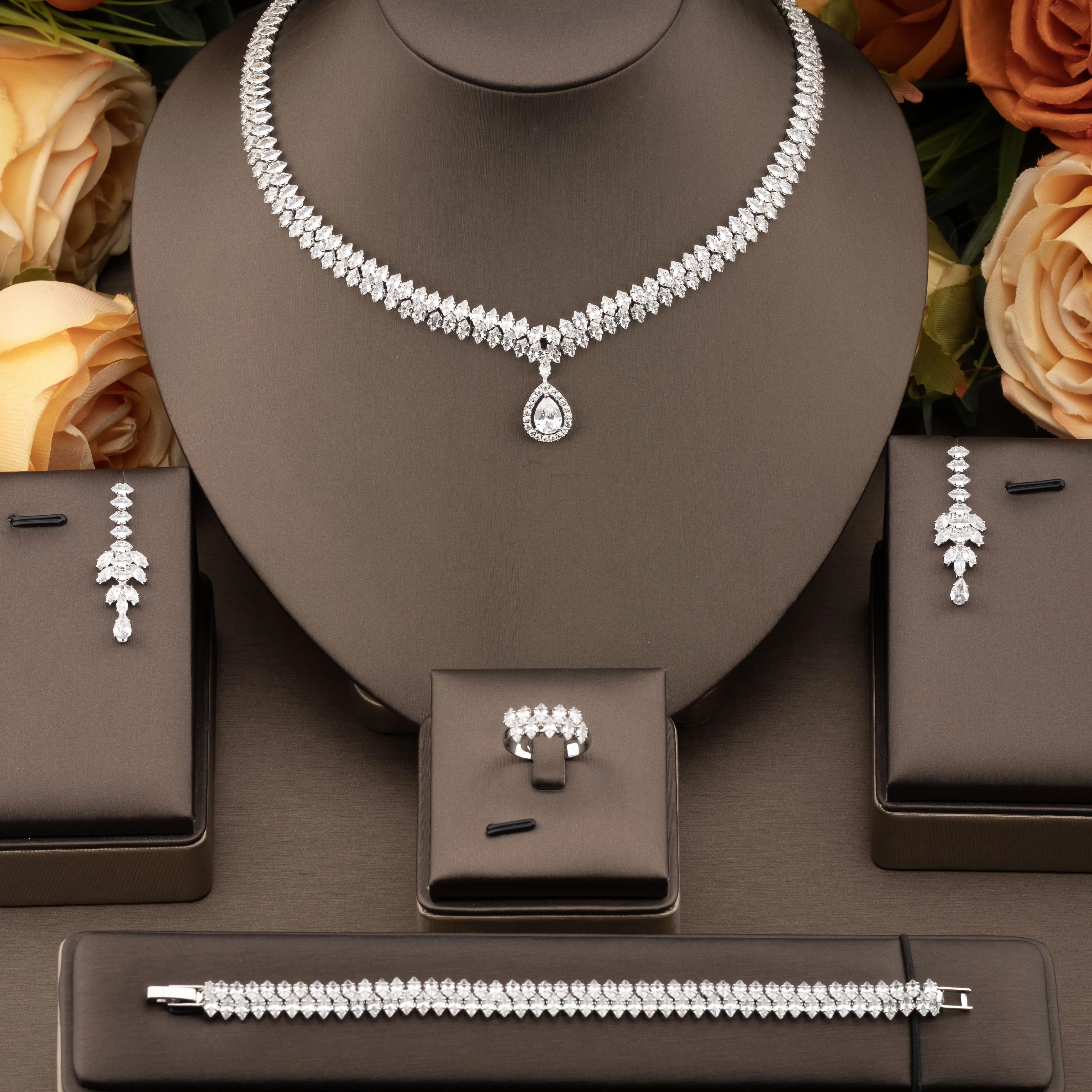 1 set of luxurious and elegant jewelry set with sparkling cubic zirconia teardrop design, suitable for women to wear at weddings and banquets. Gift box not included