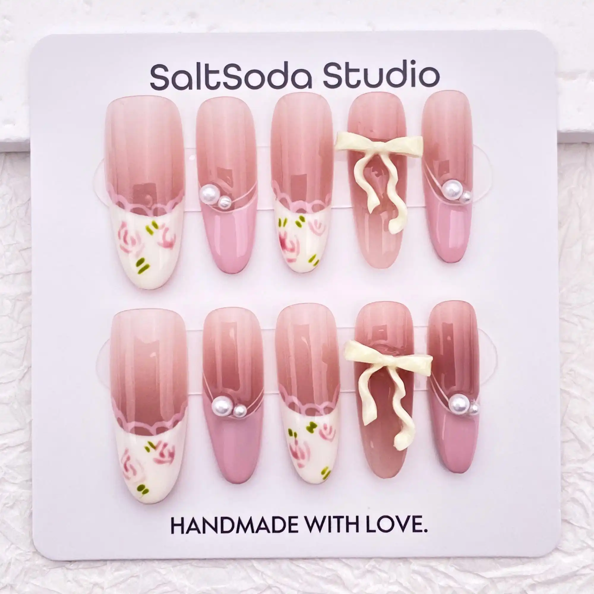 

Cute hand-painted floral 3D bow lace nail art, sweet light pink French manicure, reusable, high-quality nail art.