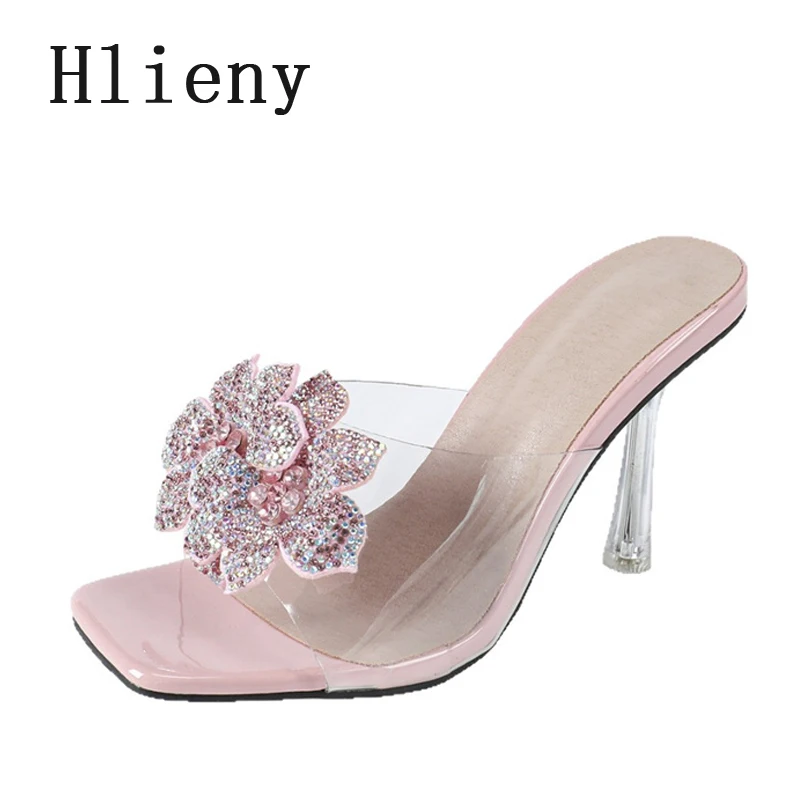 

Hlieny странный стиль, прозрачные тапочки из ПВХ, женские дизайнерские сандалии на высоком каблуке с кристаллами и цветами, пикантные модельные туфли с квадратным носком