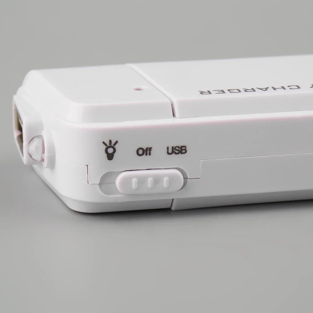 Cargador USB portátil Universal para teléfono móvil, extensor de Batería 2 AA, caja de fuente de alimentación, MP3, MP4, blanco y negro, nuevo