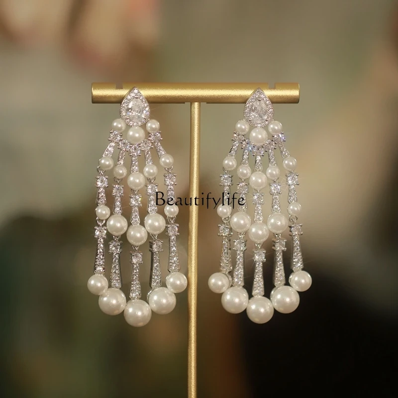 

European and American Bead Curtain Heavy Industry Pearl Tassel Modified Face Slimming Zircon Silver Pin Earrings