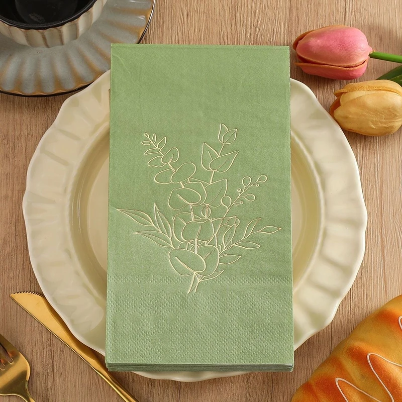 Paper napkins with gold-foil leaves
