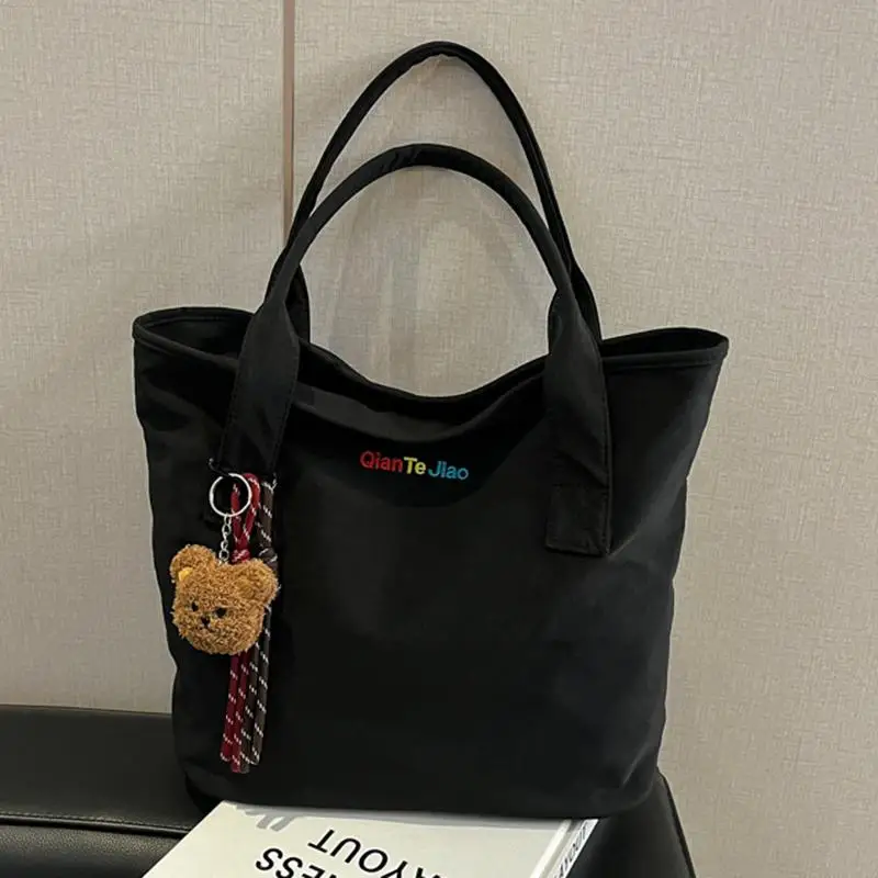 bolsa-tote-estilo-hippie-em-cor-solida-harajuku-2024-nova-bolsa-casual-com-letras-para-estudantes-universitarios-bolsa-transv