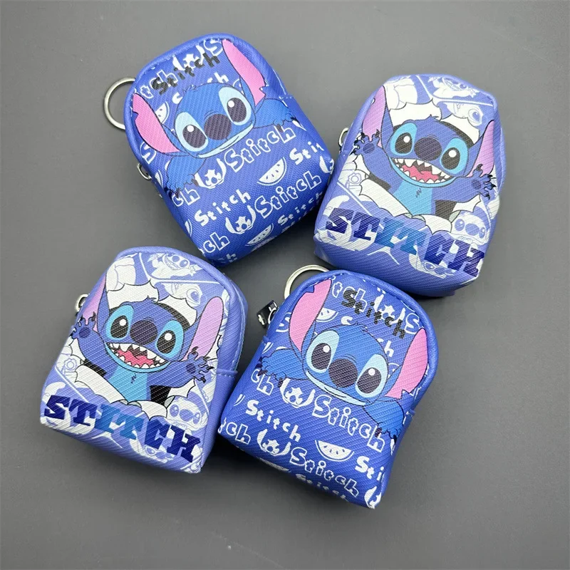 Aleatório 1 pçs disney stitch mini moeda bolsa bonito figura fone de ouvido batom saco de armazenamento feminino mochila decoração dos desenhos animados chaveiro